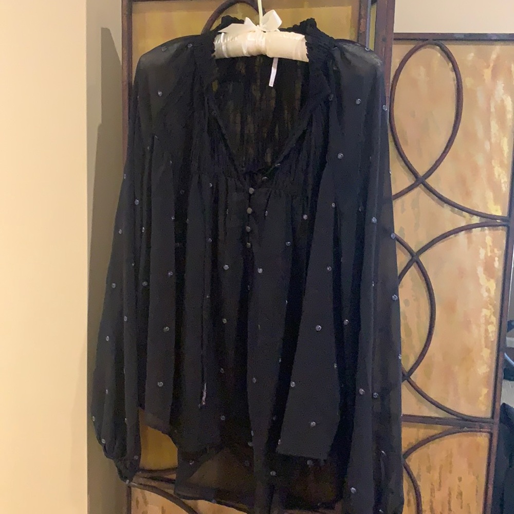 Sheer black peasant top. Embellished.